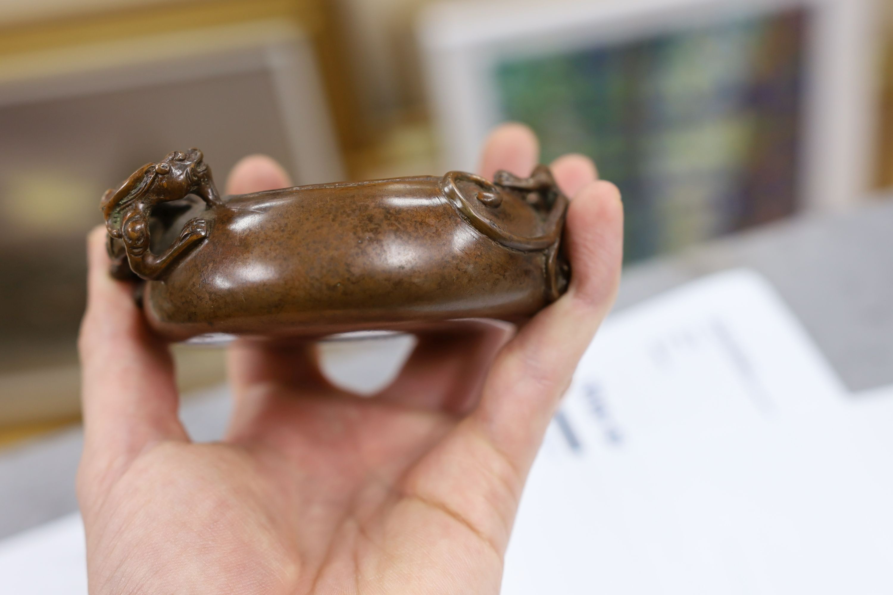 Two Chinese bronze censers, largest 11cms diameter